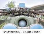 Small photo of helicopter jet engine turbine intake and rotor blade closeup front exterior view of airplane motor gear shaft to drive propeller aircraft vehicle machinery technology equipment technical reference
