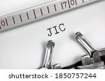 Small photo of Just in case initialism JIC text macro closeup, typewriter typed acronym information newsletter bulletin abbreviation notice concept, reminder letter memo message document info retro metaphor, large