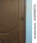 Small photo of Wood door and hinder the subscribe button below