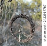 Small photo of Peace symbol made from bitch branches