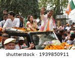 Small photo of Guwahati, India. 19 March 2021. Bharatiya Janata Party (BJP) candidate from Jalukbari constituency Himanta Biswa Sarma waves at his supporters during a rally before filing his nomination papers.