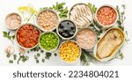 Small photo of An assortment of processed food with long shelf life, canned fish and vegetables.