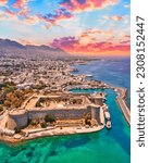 Small photo of Kyrenia Castle in old harbour in North Cyprus on sunny day with clear sky