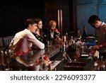 Small photo of Celebration, Party People concept. Business peoples man and woman Enjoying Evening Drinks in executive bar.