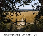 Small photo of Stile to a footpath through a field in the Kent countryside. Location: near Snodland, Kent.