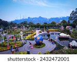 Small photo of Bandung, Indonesia - 4 July 2023 : the excitement of visitors while exploring the world in a miniature version. the name of this place is Mini Mania.