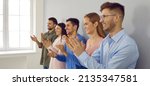 Small photo of Banner narrow shot of overjoyed diverse businesspeople applaud show appreciation and acknowledgement. Smiling employees clap hands greeting or congratulating with promotion.