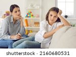 Small photo of Kid at psychologist's office. Child refusing to have conversation. Sad, apathetic, indifferent preeten or teenage girl turns away and ignores therapist unwilling to talk about problems and emotions