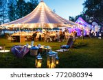 Colorful wedding tents at night. Wedding day.