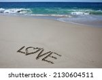 Love. Words Written In Beach...