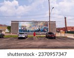 Small photo of The mural "Community Heart of REO" by artist Tony Hendrick Lansing, Michigan July 16th 2023