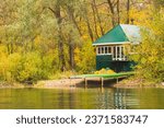 House on the lake in autumn. A place for a country holiday.