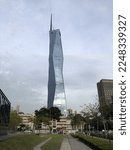 Small photo of Kuala Lumpur, Malaysia - January 12 2023: Evening view of the second tallest tower in the world. KL PNB Merdeka 118. Reflection at glass surface. Clear blue sky. Capital city commercial center.