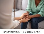 Small photo of African psychologist hold hands of girl patient, close up. Teenage overcome break up, unrequited love. Abortion decision. Psychological therapy, survive personal crisis, individual counselling concept