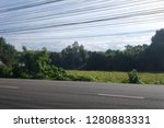 Small photo of Inordinate electric wires in countryside,Thailand