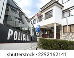 Small photo of Police car in front od police station. Inscription: police.