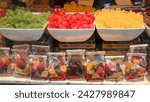 Small photo of Brussels, Belgium, 09 May 2023: Colorful Gummies. Gummy candy for sale on street market. Fruit flavored gummi candies at market stall.
