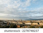 View of Florence Cathedral (Cattedrale di Santa Maria del Fiore) and rest of Florence from Michelangelo plaza at sunset. Fish eye lens. Panoramic view of Florence, Tuscany, Italy