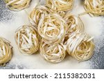 italian uncooked tagliatelle... | Shutterstock . vector #2115382031