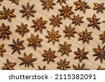 dry anise stars on wooden table.... | Shutterstock . vector #2115382091
