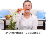 Healthy Young Woman Eating A...