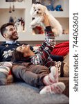 Small photo of Happiness in young couple family with cute Meltzer for Christmas