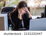 Concept Burnout Syndrome. Business Woman feels uncomfortable working. Which is caused by stress, accumulated from unsuccessful work And less resting body. Consult a specialist psychiatrist.