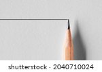 Small photo of Wooden pencil draws a straight line. Stability or stagnancy concept in business market.