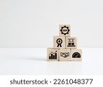 Small photo of The acronym OEM Original Equipment Manufacturer on wooden cubes. Business model that makes subsystems or parts to make the end product.