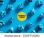 Small photo of Reference checks message with crumpled blue paper balls on blue background. Dishonesty and cheating in business references. Eliminating reviewed references. Reference assessment and evaluation.