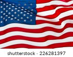 us flag in rippling with wind  | Shutterstock . vector #226281397