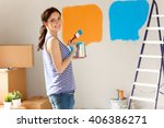 Happy Smiling Woman Painting...