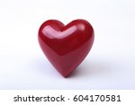 a red heart isolated on white... | Shutterstock . vector #604170581