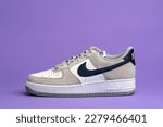 Small photo of ROME - MARCH 2023: Brand new Nike Air Force One sport shoe isolated. Nike is one of the world's largest suppliers of athletic shoes. The company was founded in 1964. Illustrative editorial.