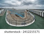 Small photo of PENZANCE, UK - JUNE 27, 2023: Jubilee Pool, one of the oldest surviving Art Deco swimming baths in England - opened in 1935, the year of King George V's Silver Jubilee. Cornwell, UK.