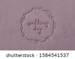 Small photo of Inscription WEDDING DAY supplanted on velour wedding book.