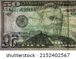 fragment of 50 dollar banknote with visible details of banknote reverse for design purpose