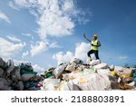 Small photo of ecological engineering standing on the mountain rubbish big pile of garbage degraded waste A pile of bad smells and toxic residues. These wastes come from urban areas. industrial area
