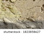 Small photo of grey lithoidal background of old plaster