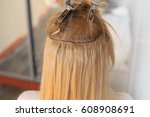 Hair is sewn on a pigtail, hair extensions, blond, blonde, white, strand, tracks