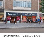 Small photo of Exeter, UK - July 2022: Exeter High street shop fronts of Monsoon and Accessorize stores. Monsoon Accessorize is a British high street fashion retailer with over 125 stores