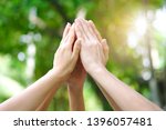 Small photo of hand up of people working assemble corporate meeting show symbol Join forces teamwork quality and effective personnel Concept organizational development in teamwork and business