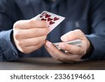 Small photo of Shuffle the cards gambling poker cards in casino and casino chips poker table game business gambling concept