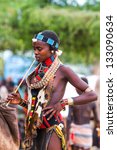 Small photo of OMO VALLEY, ETHIOPIA - AUG 15: Hamer woman in the Turmi market, the ethnic groups in the Omo valley could disappear because of Gibe III hydroelectric dam on Aug 15, 2011 in Omo Valley, Ethiopia.