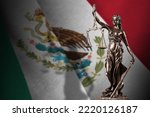 Small photo of Mexico flag with statue of lady justice and judicial scales in dark room. Concept of judgement and punishment, background for jury topics