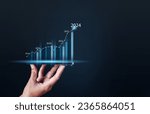 Small photo of graph, business, chart, growth, success, analysis, investment, diagram, finance, marketing. close up hand has bar chart summary of years investment, that's diagram inversely proportional bar.
