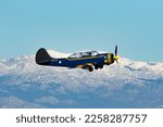 Small photo of Madrid, Spain- February 5, 2023: Air show of vintage airplanes over the sky of Madrid. Yakovlev Yack 52 model stunt plane. old planes