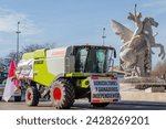 Small photo of Madrid, Spain- February 21, 2024: Farmers strike in Madrid. Tractors circulate in caravans through Madrid to vindicate their rights. Farmers and ranchers to the slaughterhouse.