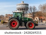 Small photo of Madrid, Spain- February 21, 2024: Farmers strike in Madrid. Tractors circulate in caravans through Madrid to vindicate their rights. Farmers and ranchers to the slaughterhouse.