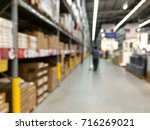 blurred background in furniture warehouse. can be use for background